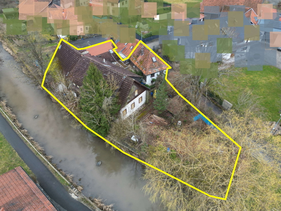Bild: Luftbild mit Grundstücksgrenzen-verpixelt.jpg
