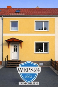 Hausansicht mit Logo