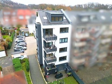 Mehrfamilienhaus / Rückansicht