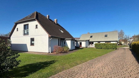 Ferienhaus und Ladengeschäft
