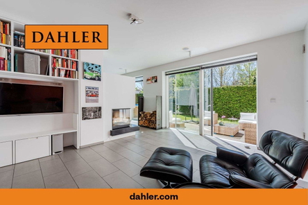 Relax by the fireplace with direct access to the l