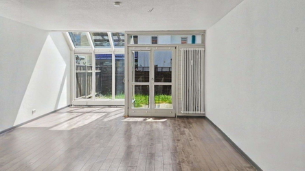 Wohnzimmer mit Wintergarten