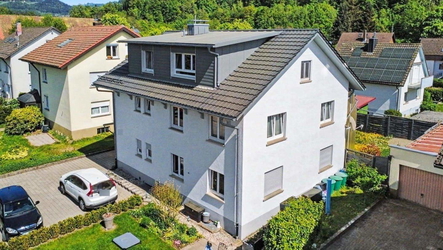 Vermietete EG mit Garten