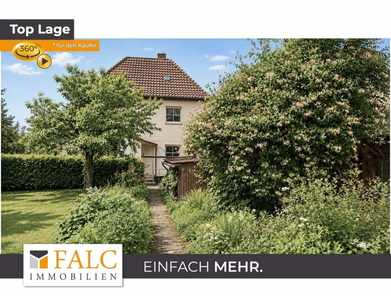 Garten mit Blick auf Haus