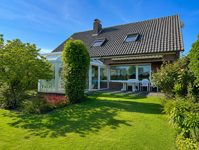 mit sonniger Terrasse und Wintergarten