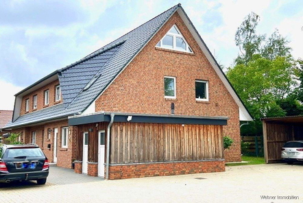 Hausansicht mit Abstellräumen