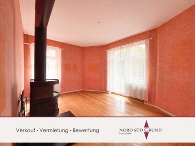 1-717 Wohnzimmer mit Kaminofen