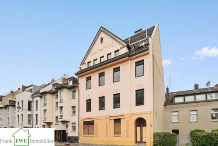 Hausansicht. 3-Zimmer-Wohnung mit Garten zum Kauf in Eller