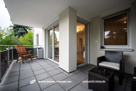 Überdachter Balkon