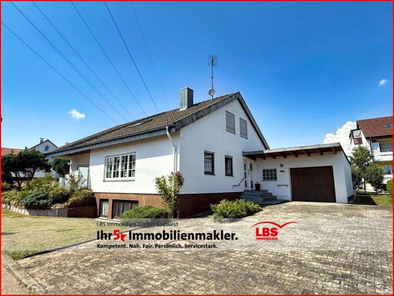 Wohnhaus mit ELW und Garage
