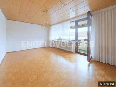 Wohnzimmer mit Zugang zum Südbalkon