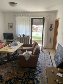 Wohnzimmer mit Balkon