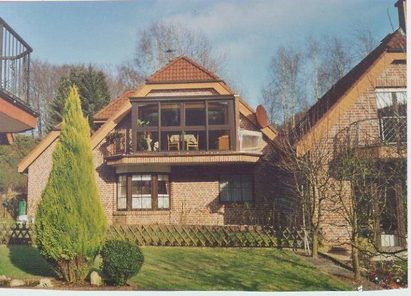 Rückansicht mit Balkonwintergarten