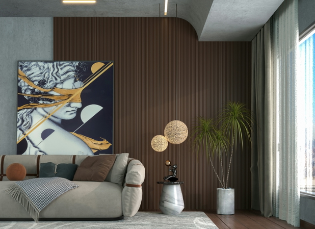 Ein modernes graues Sofa in einer stilvoll eingerichteten Wohnzimmer, an der Wand hängt ein Gemälde.