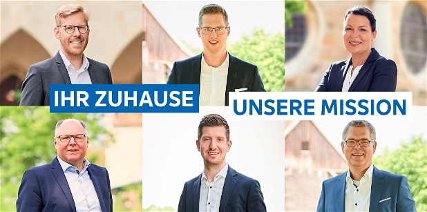 Sechs Personen aus dem Team der Volksbank Immobilien Münsterland GmbH